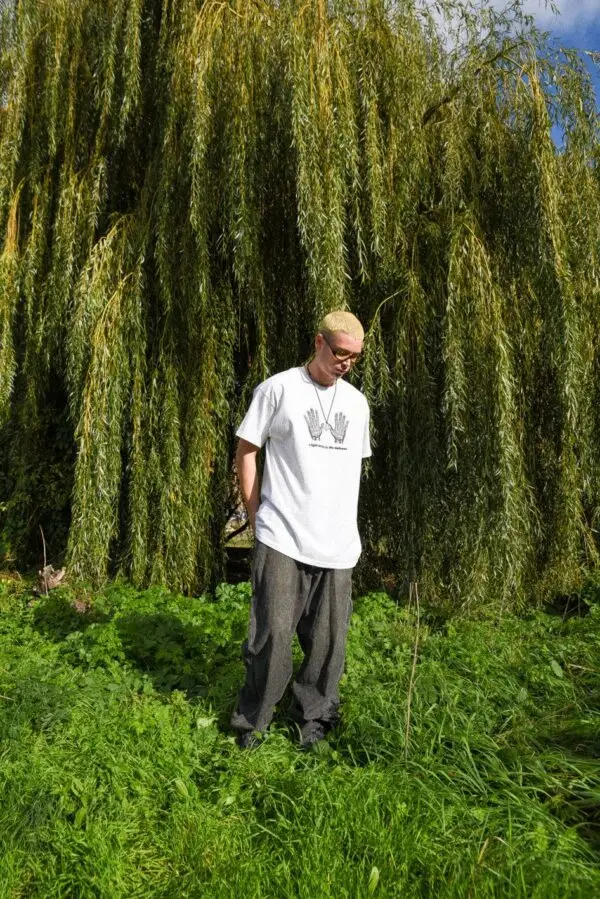 Ash Grey Graphic T-Shirt – “A Light Shines In The Darkness” - Image 3